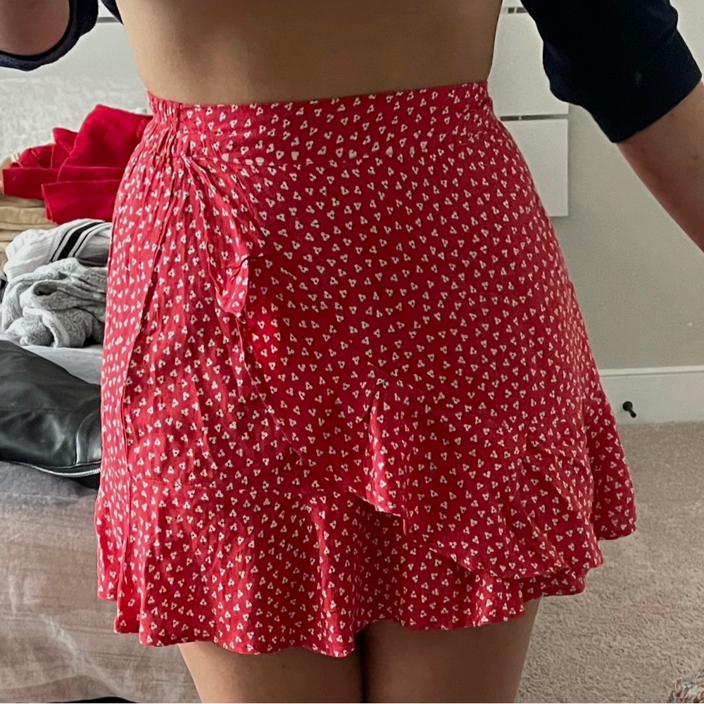 Red mini skirt.